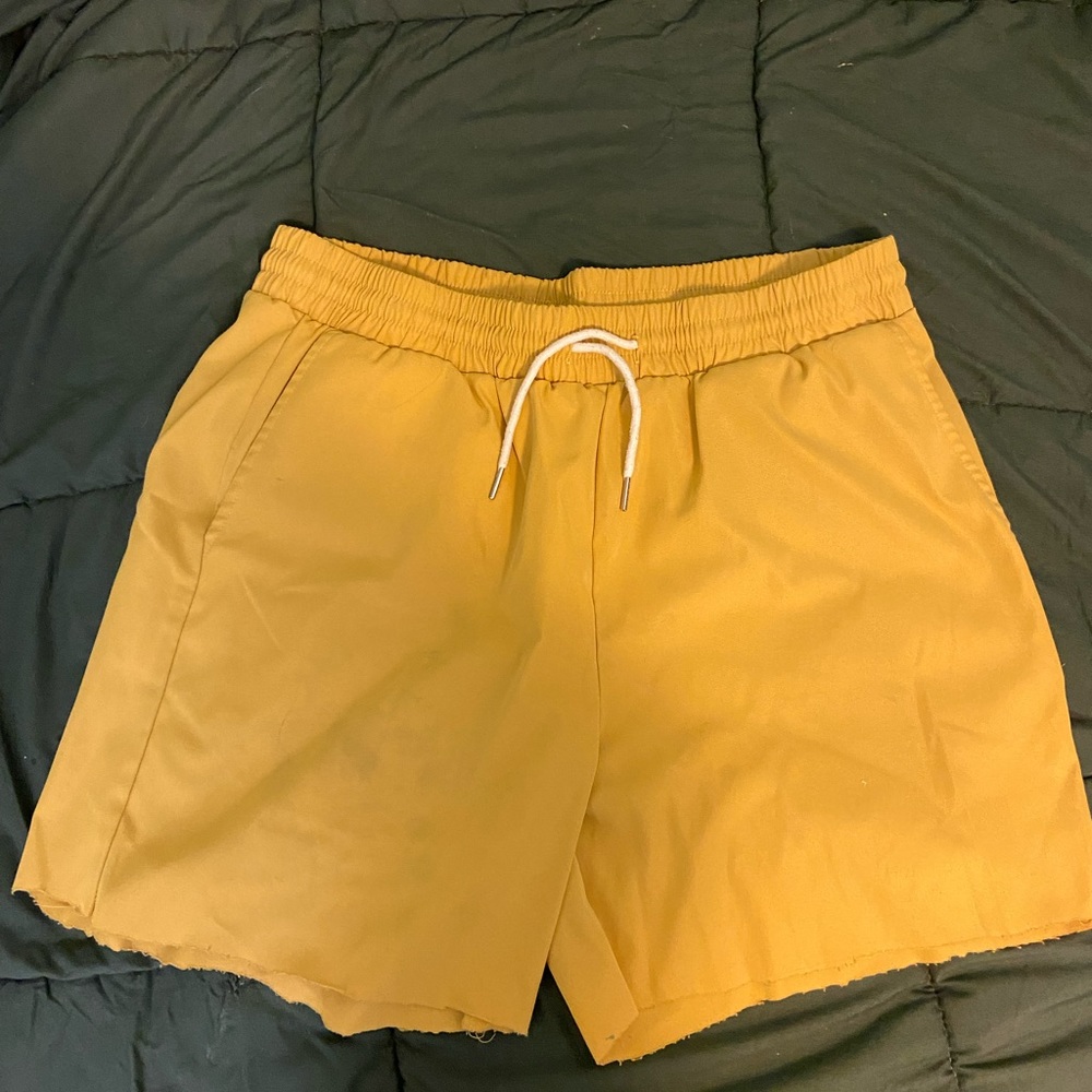 Yellow shorts size large, cut bottom
